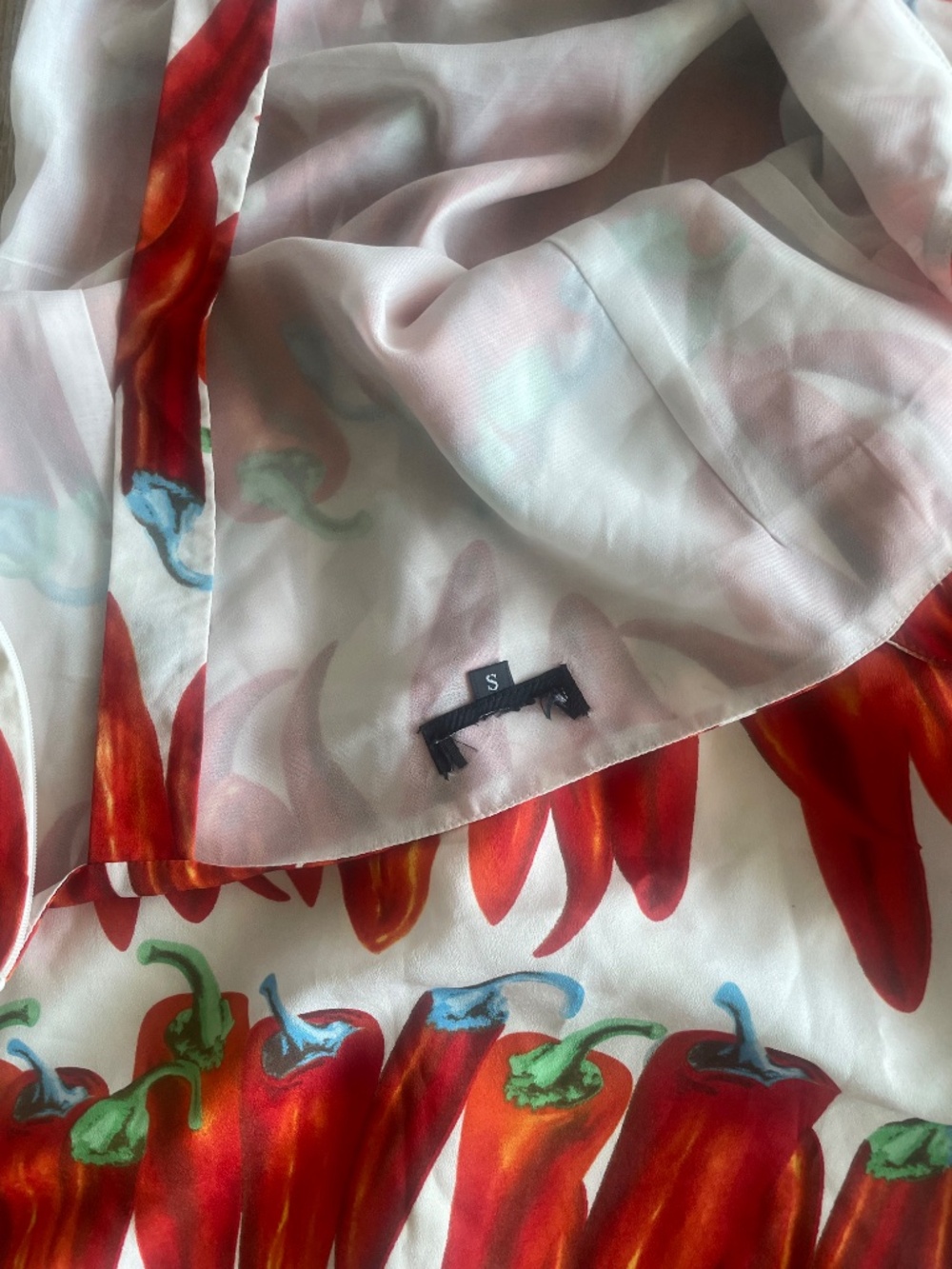 Red chili pepper print ruched mini dress featuring a side bow accent - Picture 7 of 10